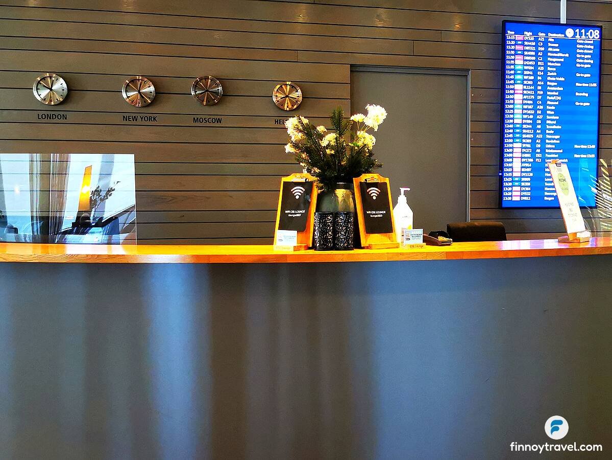 Flight information screen and Wifi login details of OSL Lounge