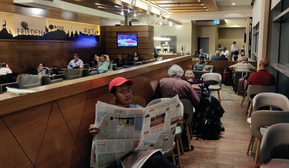 Ceasar reading newspaper in Dan Lounge, Tel Aviv