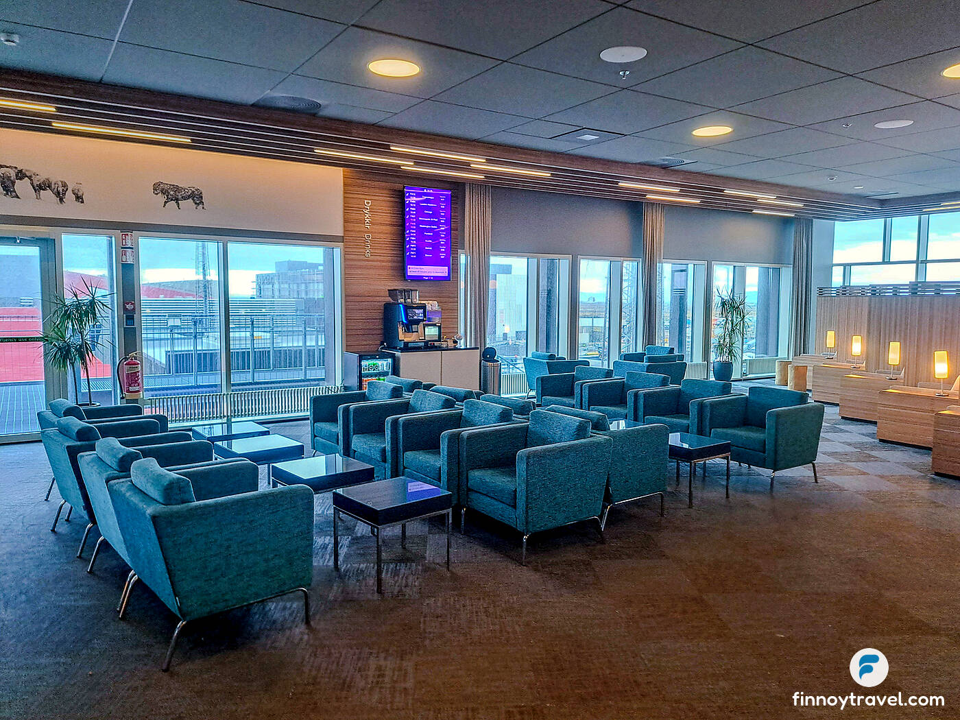 Blue chairs at the Icelandair Saga Lounge in Reykjavik, Iceland