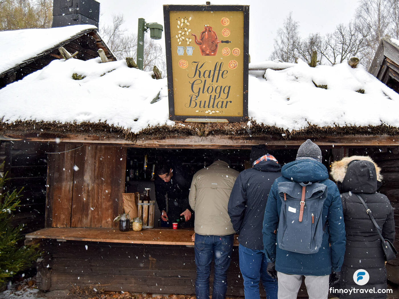 Visitors buying warm drinks at Skansen's Christmas Market