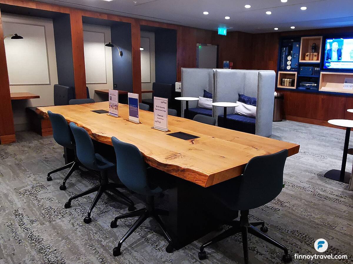 A large dining table at the Centurion Lounge at Heathrow Airport