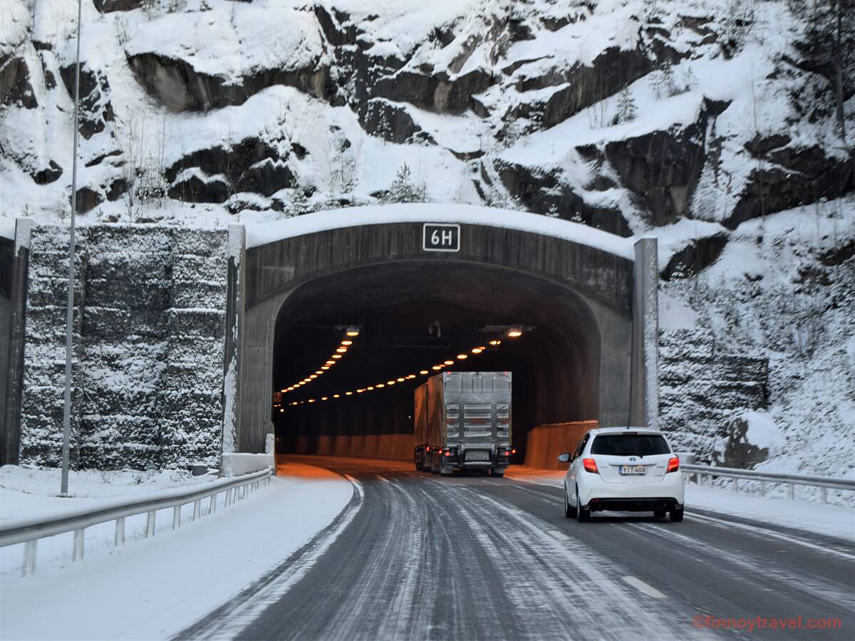 Cars driving at E18 road tunnel in Finland