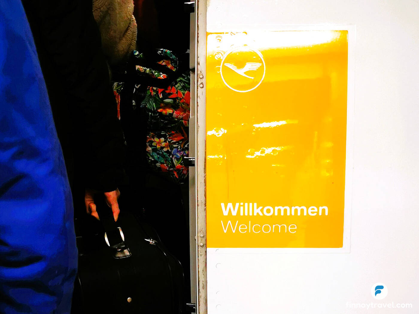 A welcome sign at the door of Lufthansa aeroplane