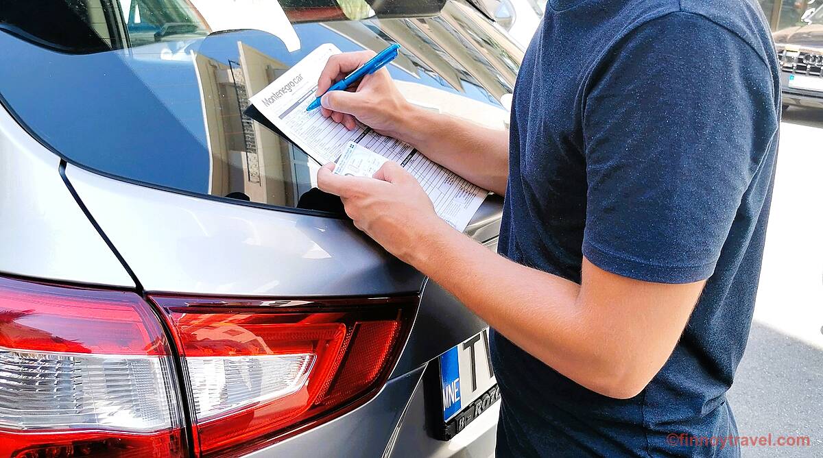 Assinatura do contrato do carro de aluguer em Montenegro