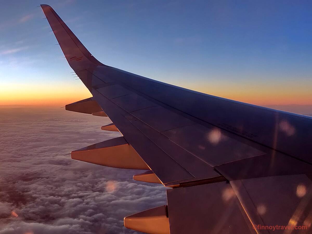 A321 da Sunclass Airlines ao anoitecer